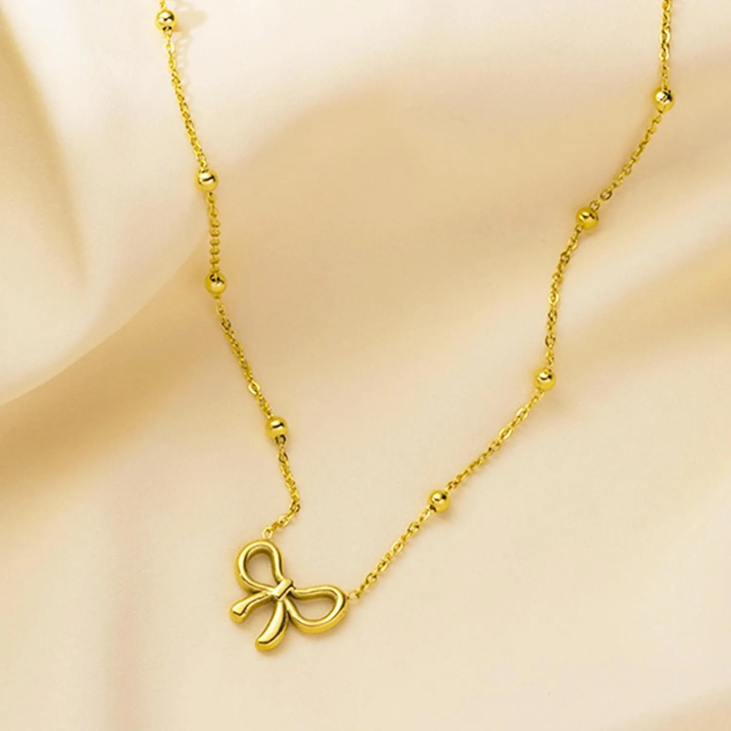 Choistily Layered Gold Initial Necklace for Women Personalized Bow Letter Pendant Stackable Jewelry Gift